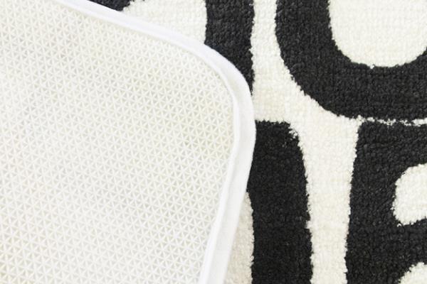 Close da almofada de banho de pelúcia